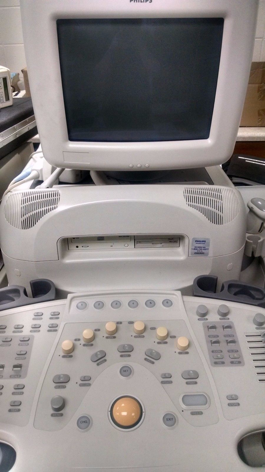 a computer monitor sitting on top of a table