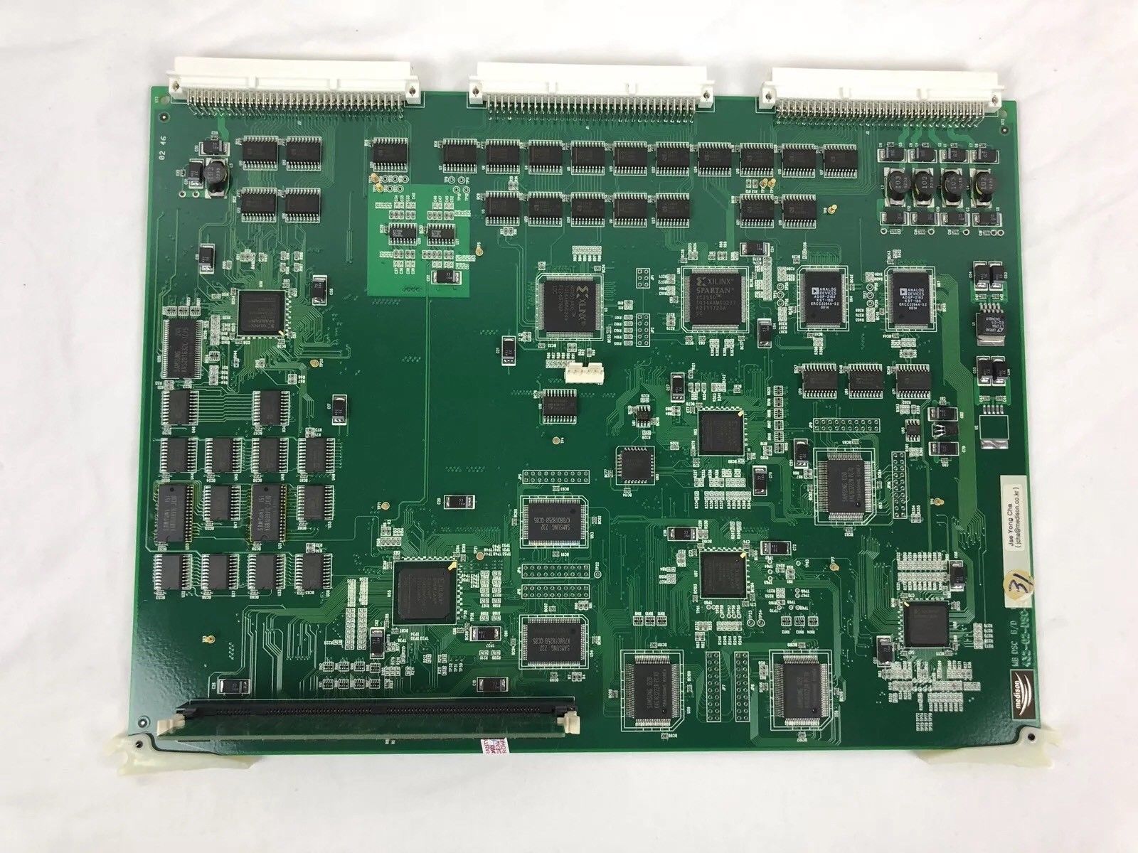 a close up of a computer board on a white surface