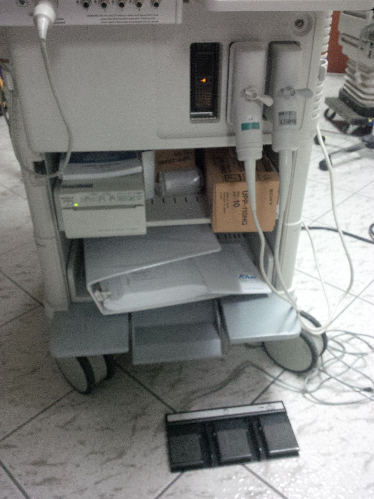 a medical machine is sitting on floor
