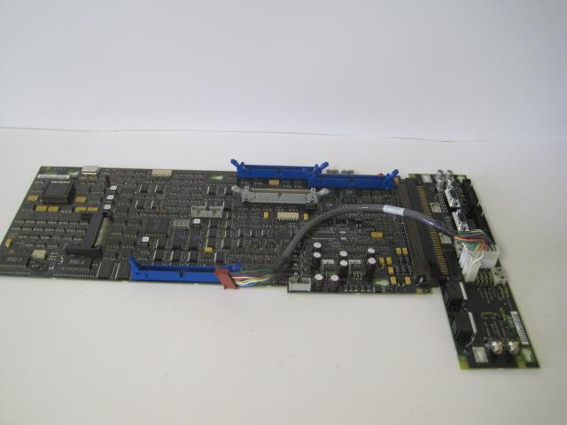 a computer motherboard with wires and wires attached to it