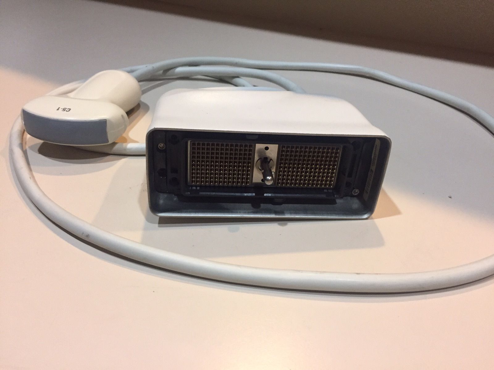 a probe connector sitting on top of a table