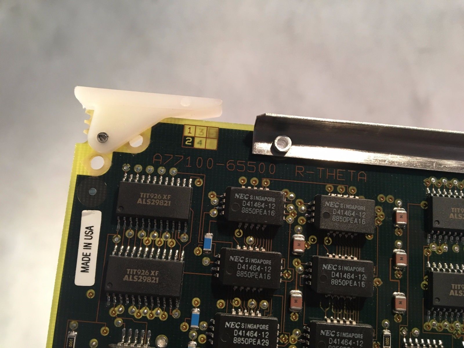 a close up of a computer board with many electronic components