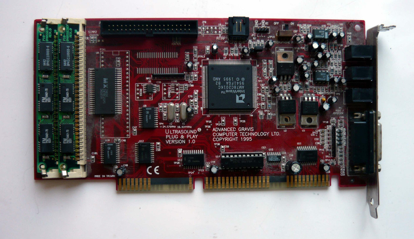 a close up of a red electronic board