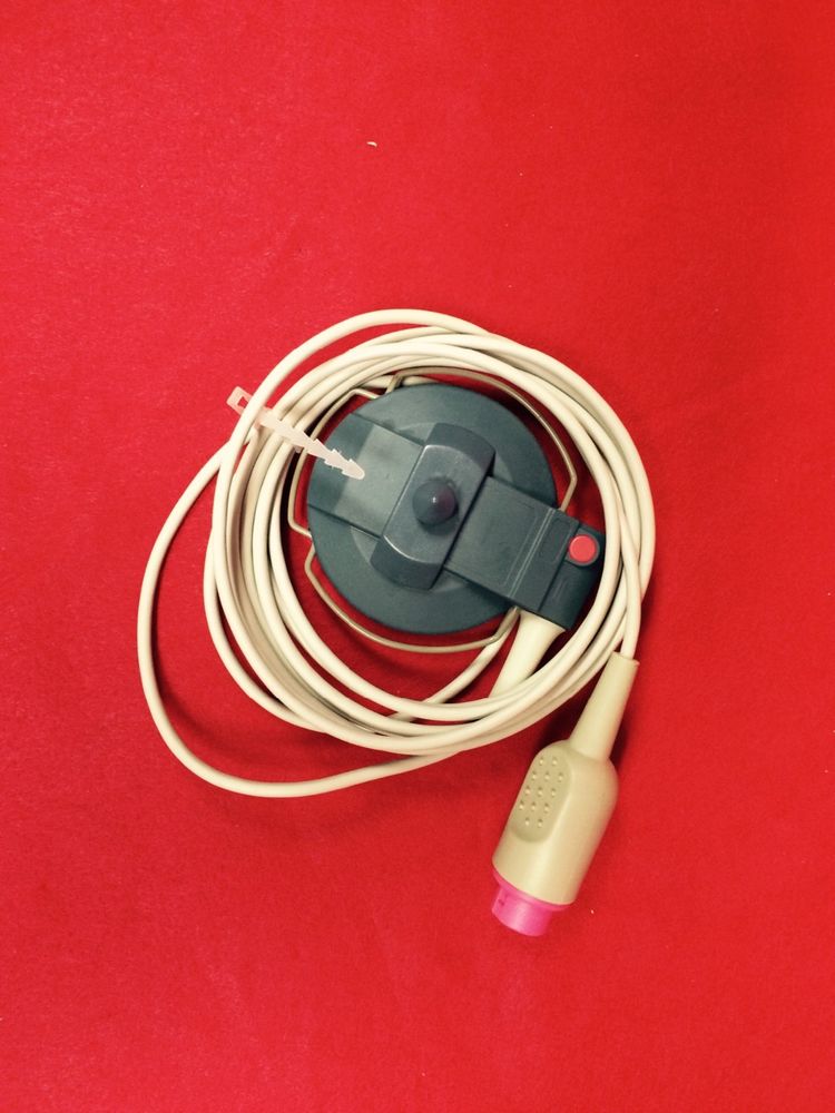 overhead shot of probe wrapped on red trable