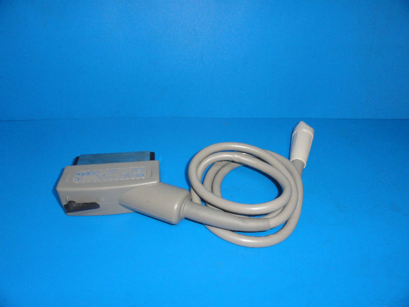 a cord connected to a device on a blue surface