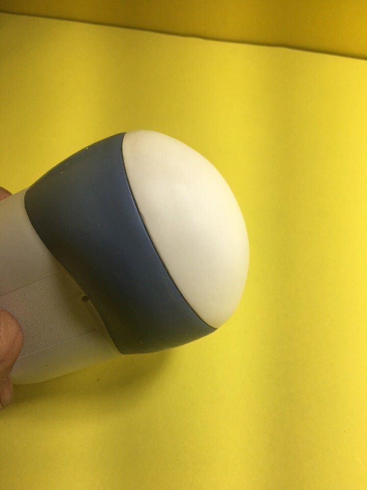 close up of probe head  with yellow background