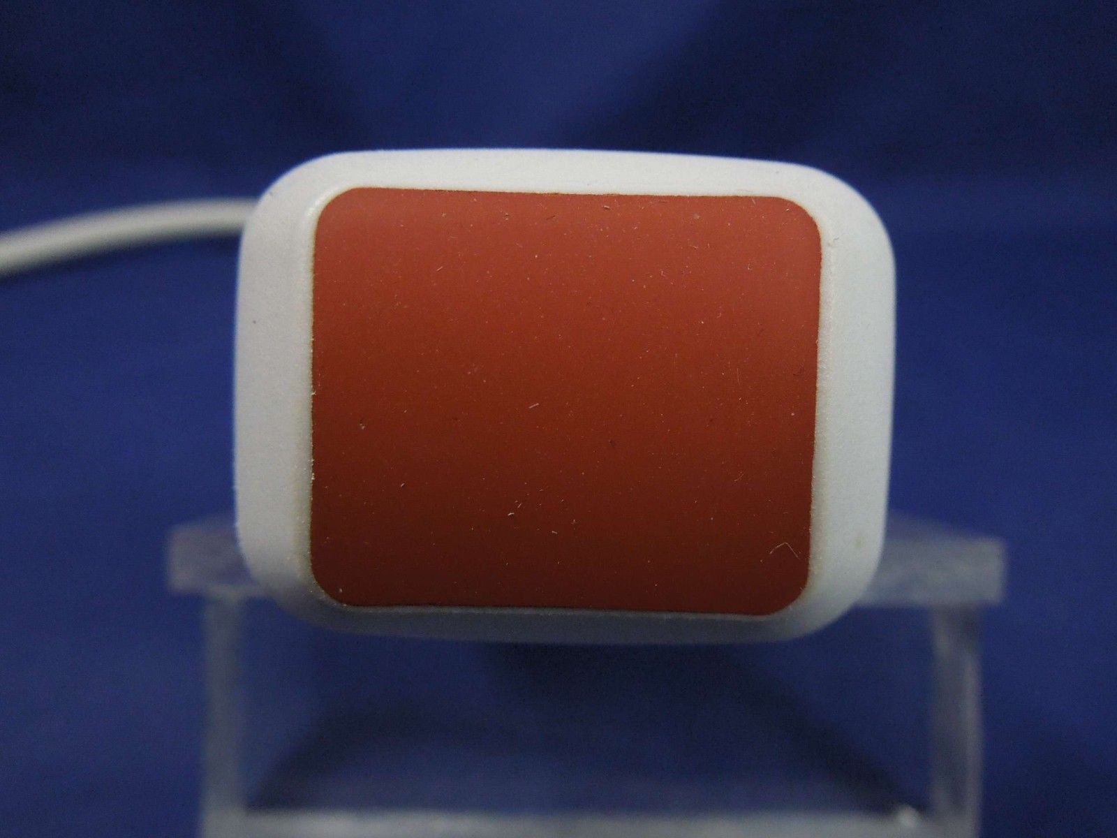 closeuo of red probe head lense