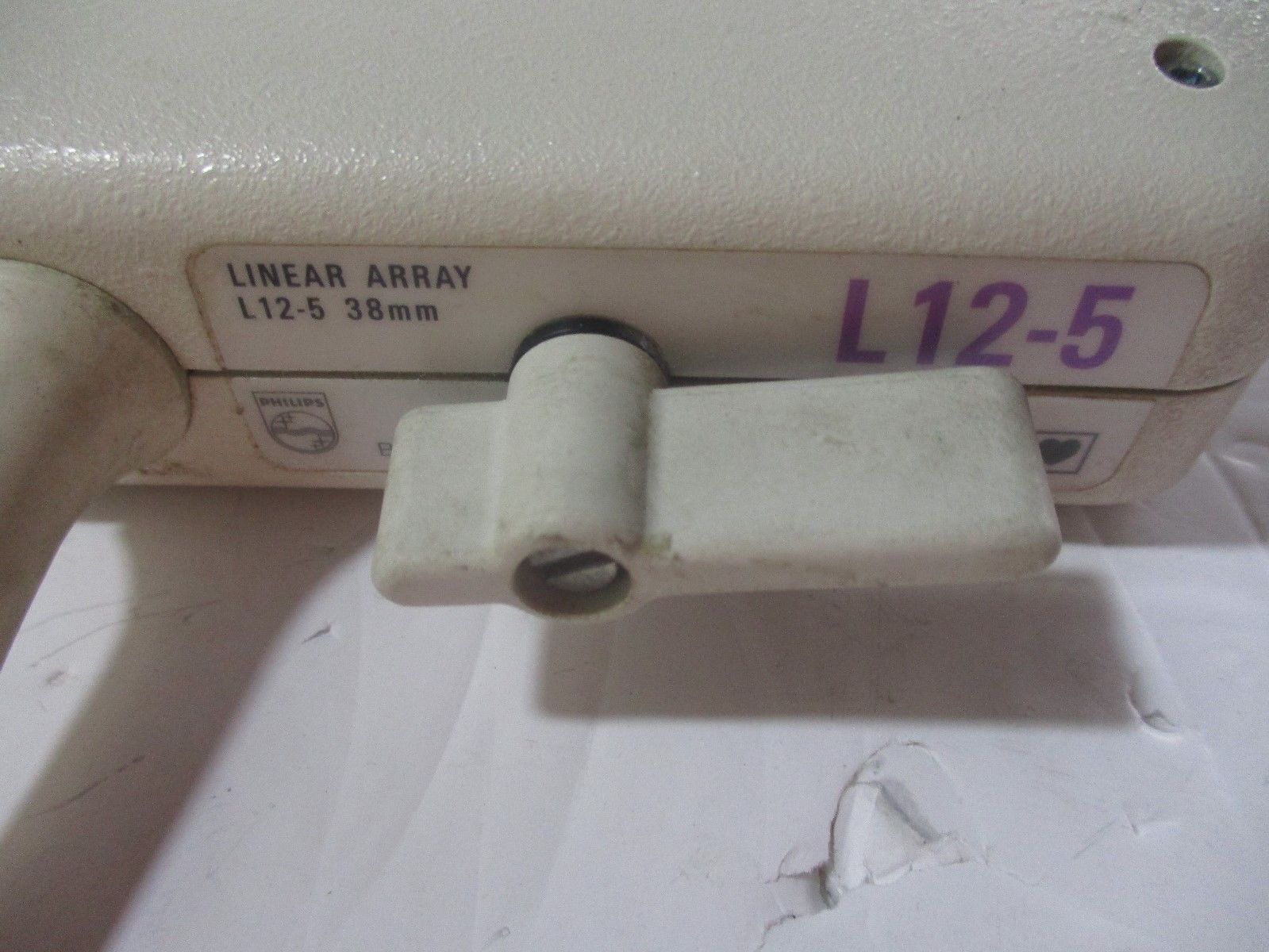 a close up of a probe with a label on it