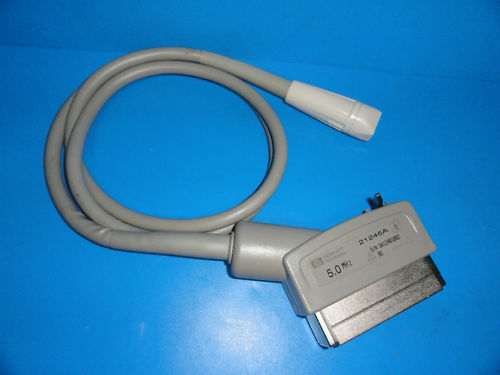 a usb cable connected to a device on a blue surface