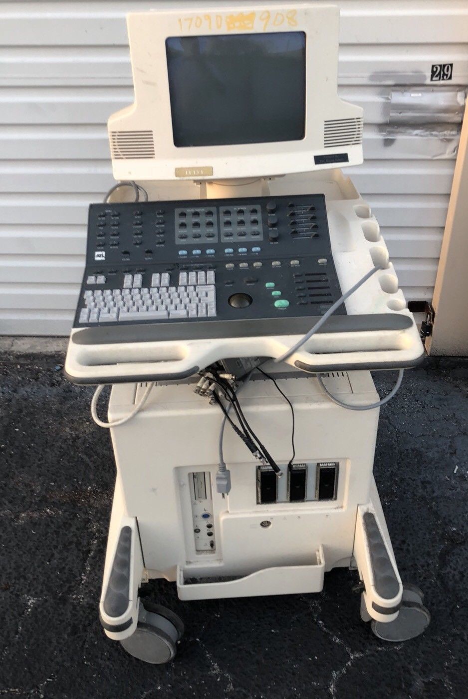 a ultrasound computer sitting on top of a white table