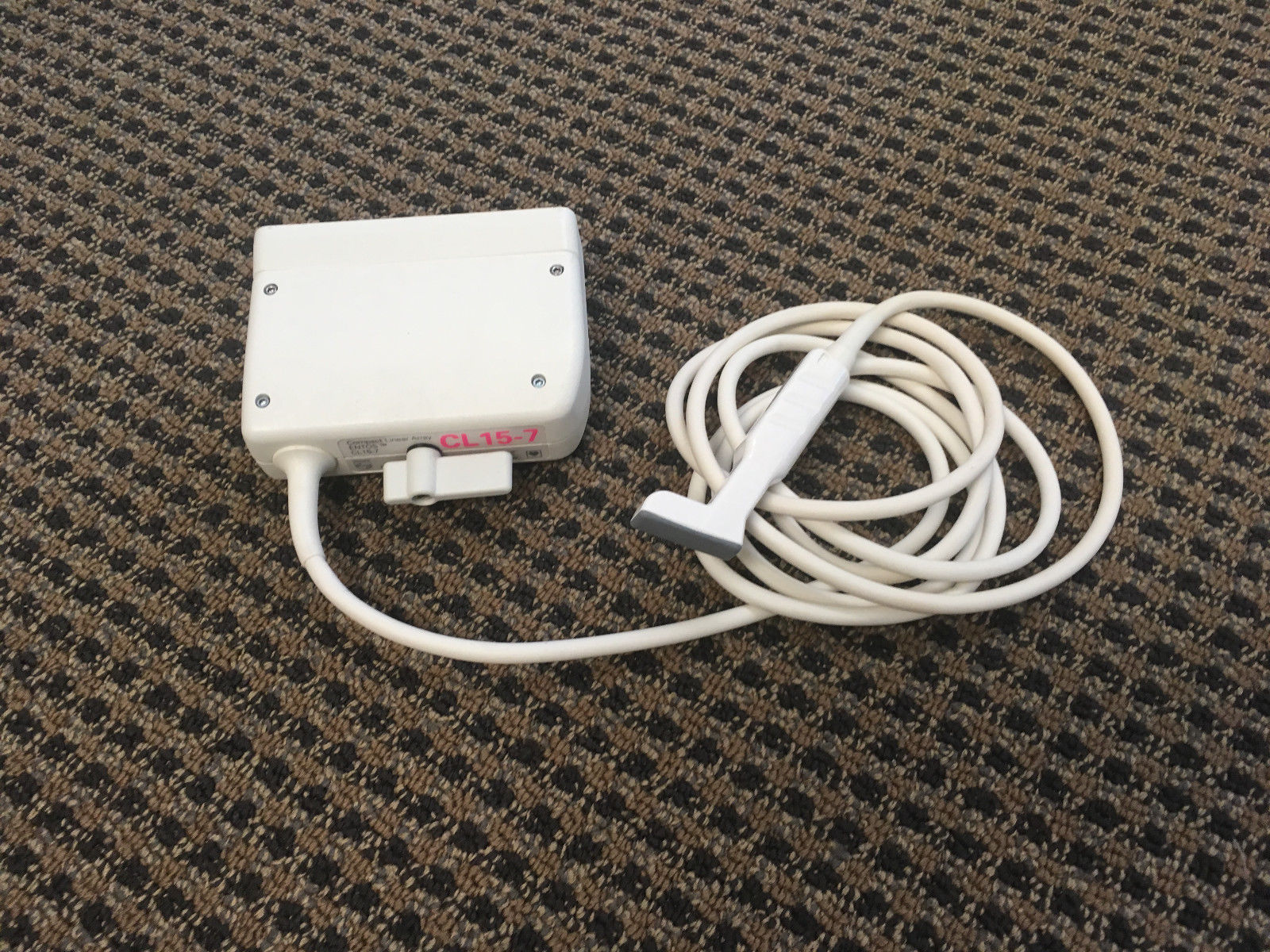 a white probe laying on desk