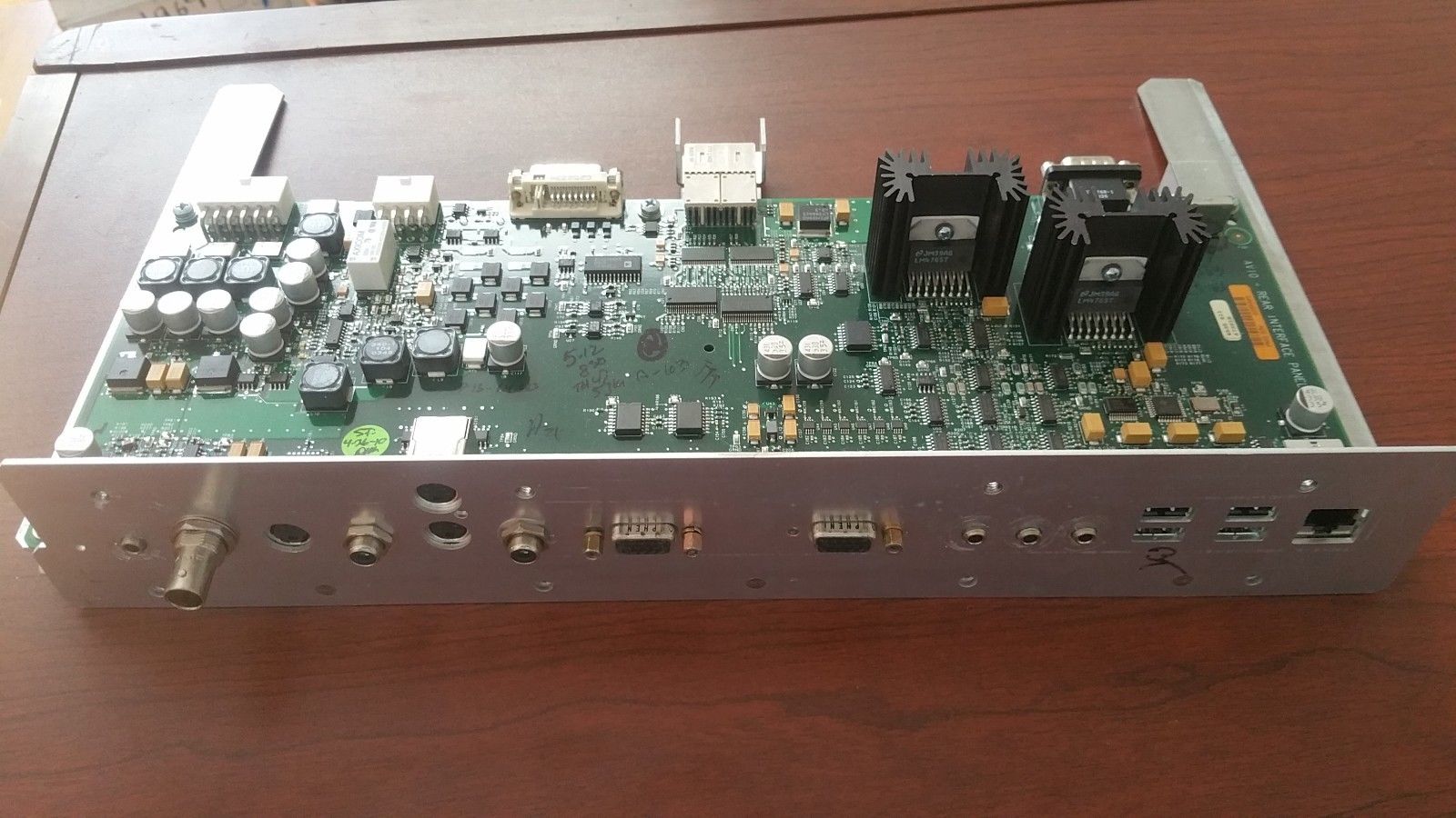 a close up of a circuit board on a table