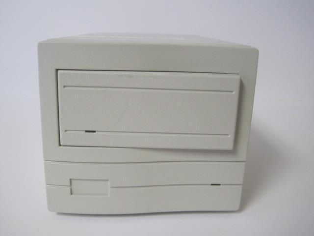 a white electronic device sitting on top of a table