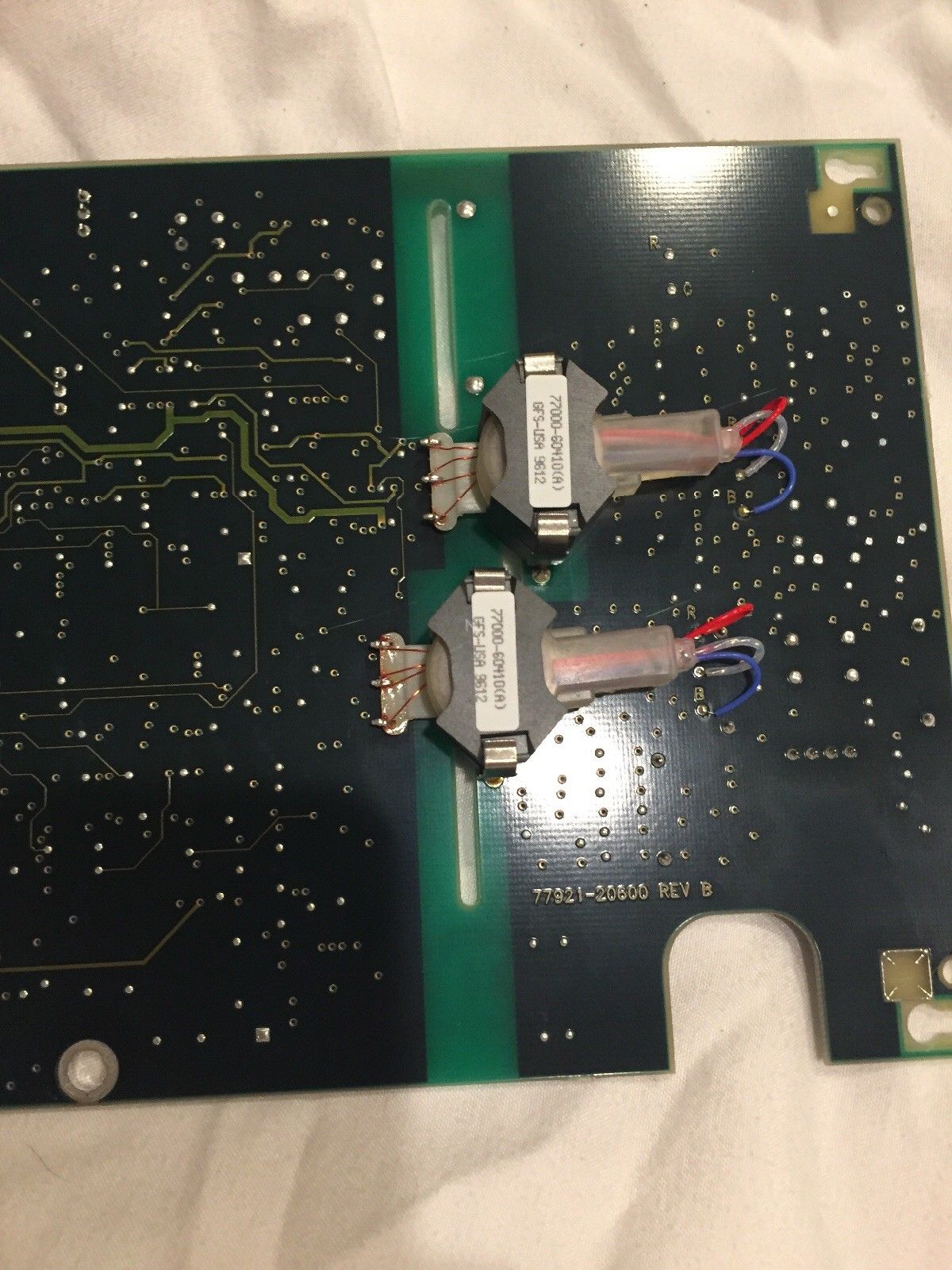 a close up of a circuit board with wires