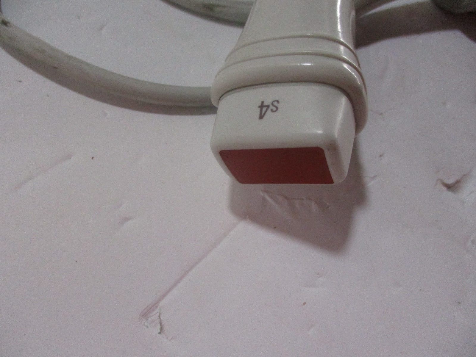 a close up of a white electrical outlet