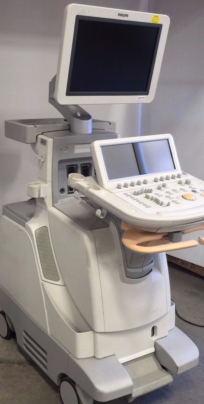 a medical machine with a monitor on top of it