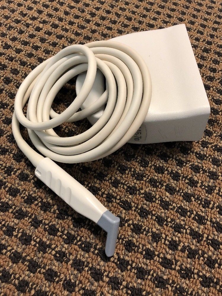 full shot of white probe on carpet