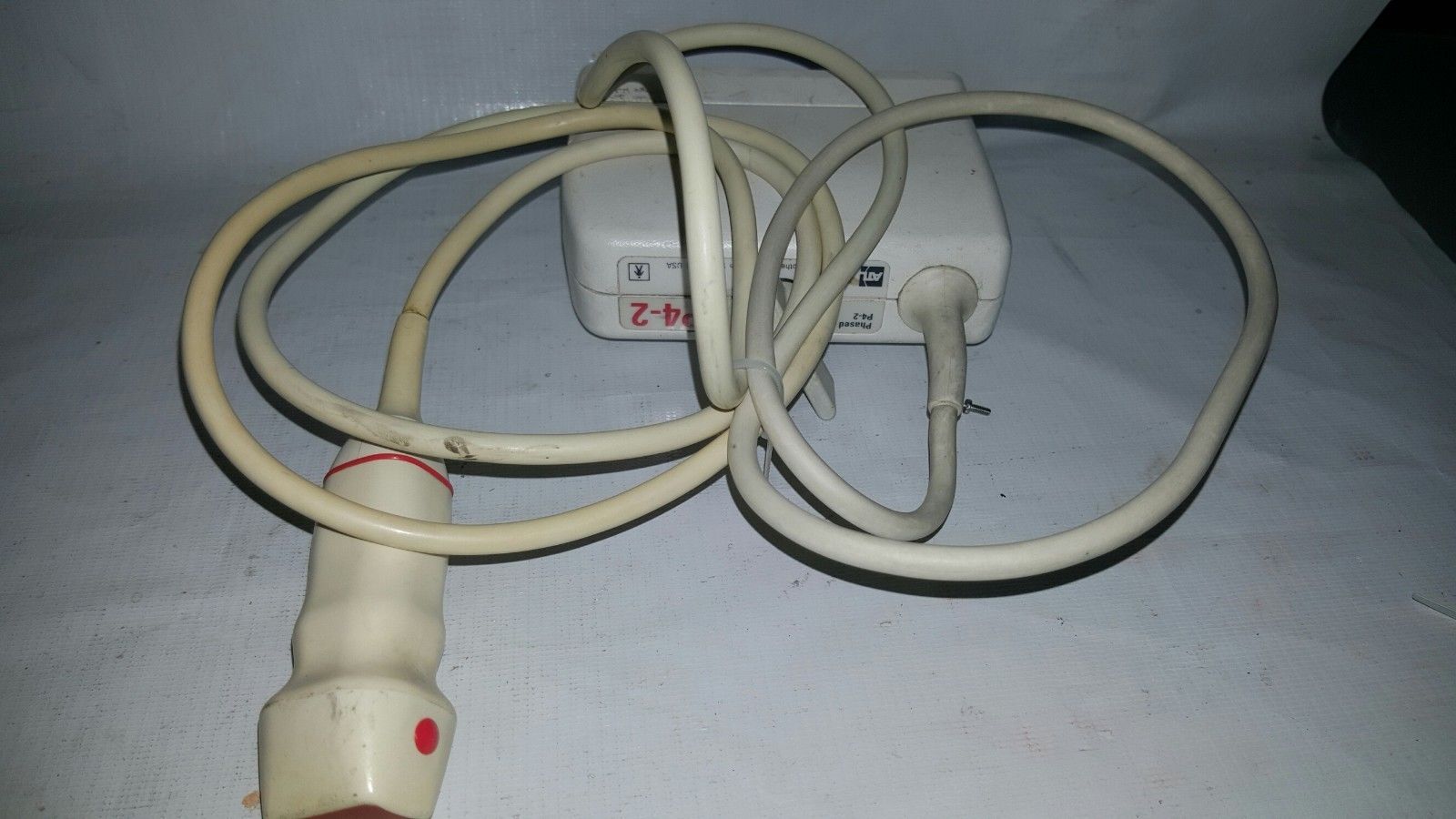 a close up of a cord connected to a device